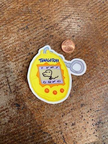 Yellow Tamagotchi Sticker – Ida Red