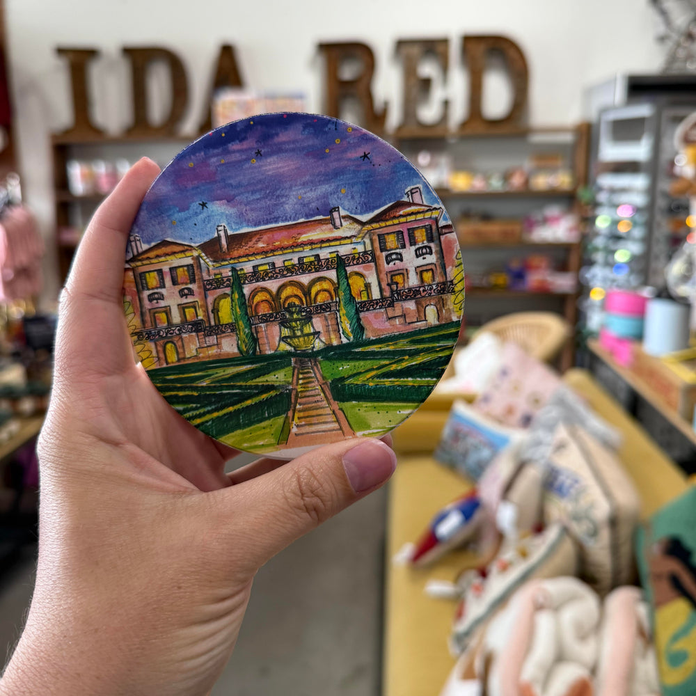 Tulsa in Ink coaster with vibrant illustration of the Philbrook Museum and gardens, printed on absorbent waterstone