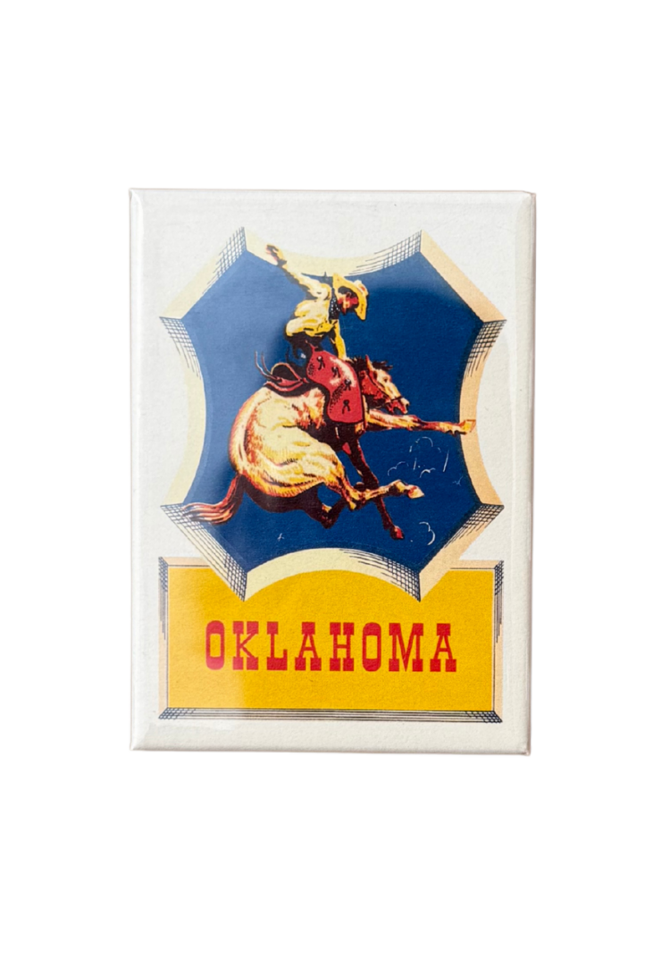 Retro-style Oklahoma magnet featuring bold artwork of a cowboy on a bucking horse