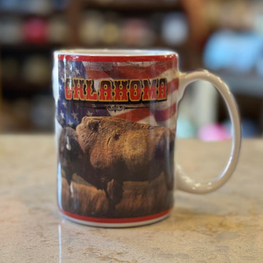 Close-up of American flag and buffalo design on Oklahoma coffee mug