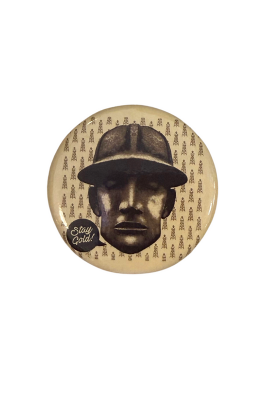 Round magnet featuring the Golden Driller statue with the text “Stay Gold,” Tulsa souvenir