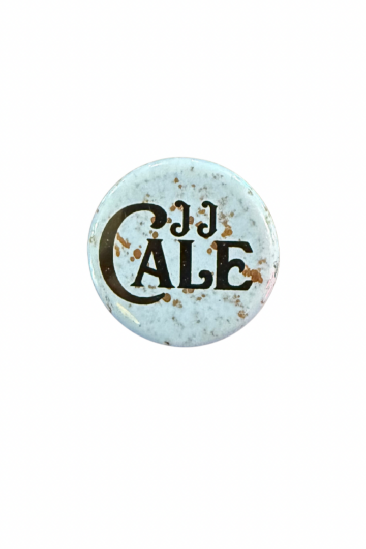 JJ Cale pinback button, light blue with black lettering