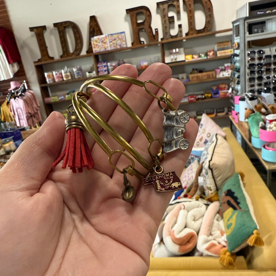 Gold-tone bracelet stack with OU-inspired charms – perfect Oklahoma Sooners fan gift or souvenir