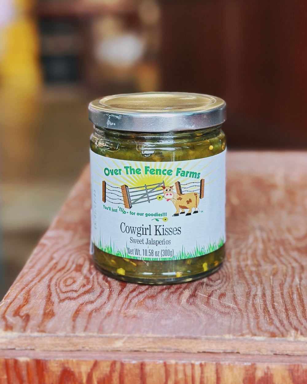 Sweet jalapeño rings by Over the Fence Farms, perfect topping for burgers, nachos, and sandwiches