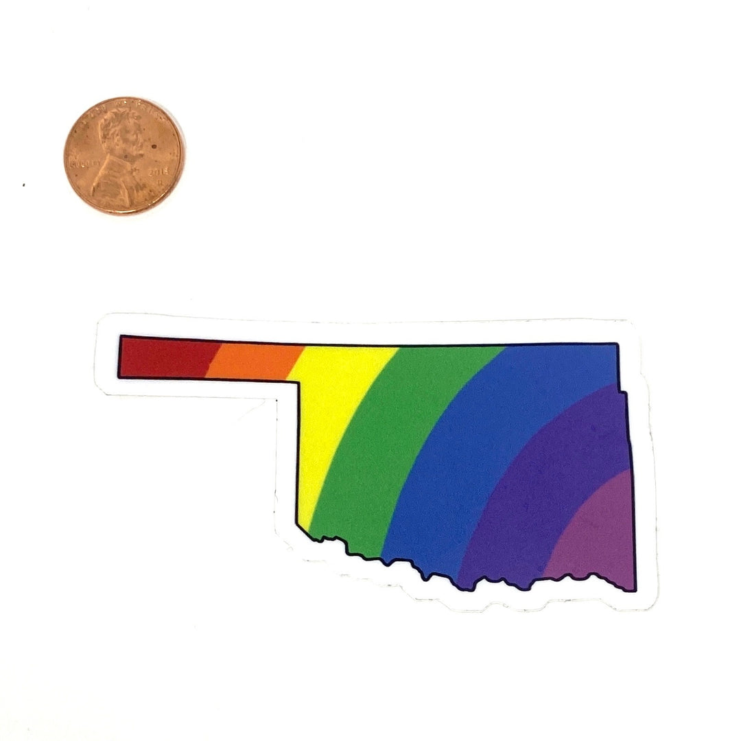 Oklahoma-shaped vinyl sticker filled with vibrant rainbow colors – bold state pride decal