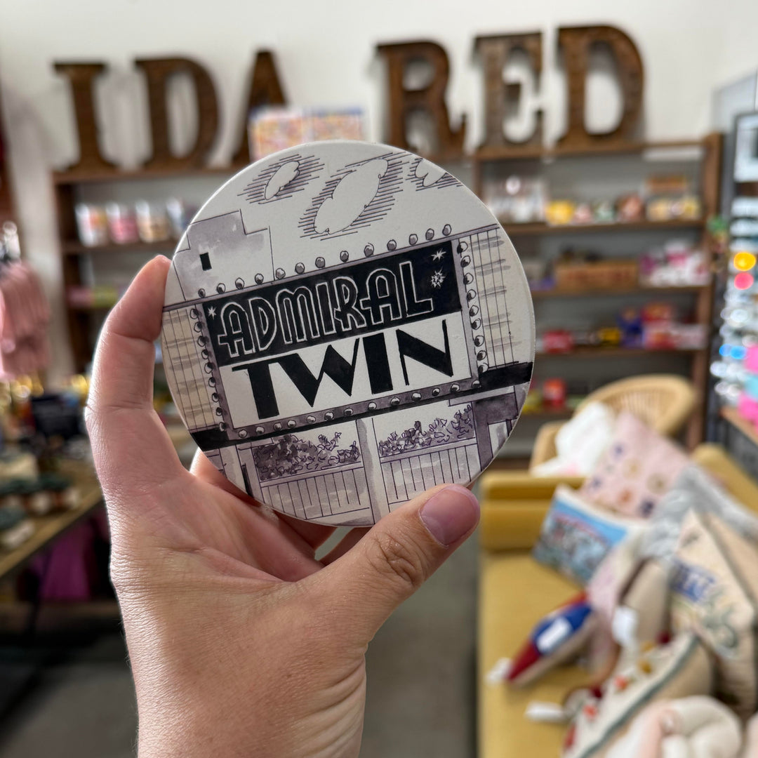 Retro-style clay coaster with artwork of Tulsa’s Admiral Twin Drive-In Theater, an Oklahoma landmark