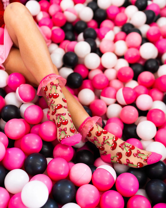 transparent socks with red ruffle trim