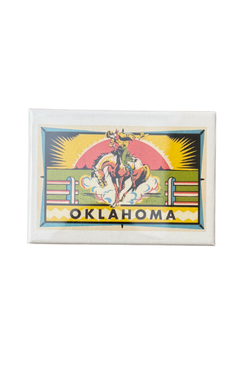 Retro Oklahoma refrigerator magnet featuring a cowboy on horseback against a Western