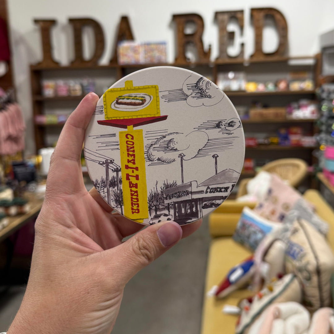 Full-color coaster from the Tulsa in Ink collection with a retro illustration of Coney I-Lander
