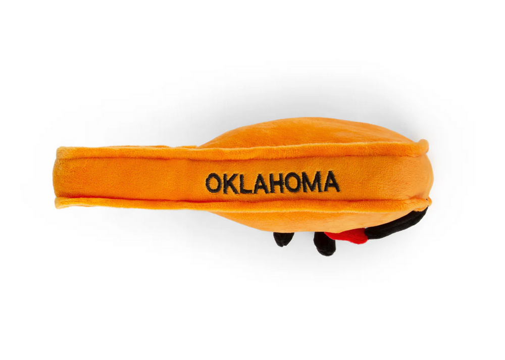Soft orange Oklahoma state plush with embroidered “Oklahoma” and smiling face