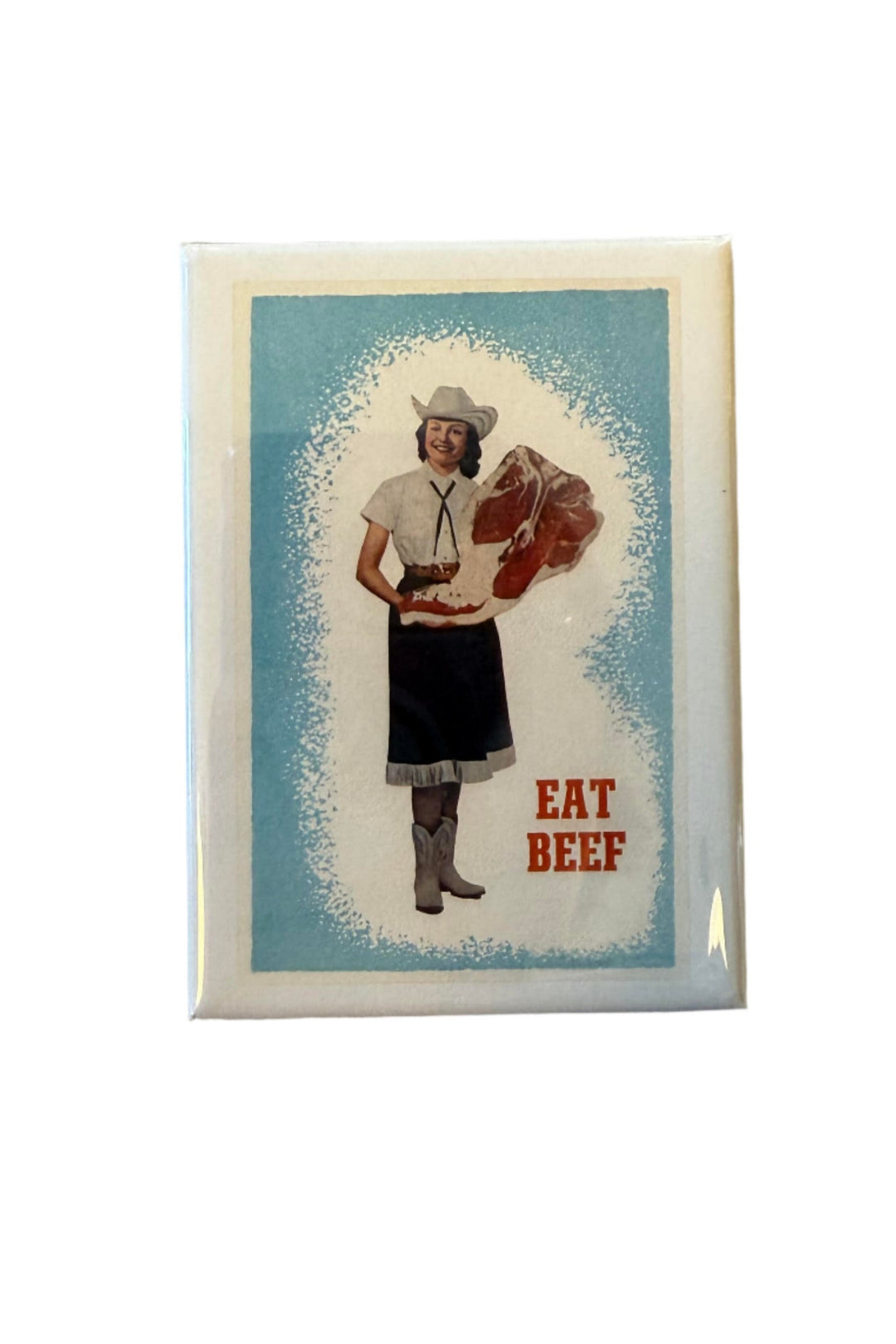 Vintage-style cowgirl holding a slab of beef with “Eat Beef” text