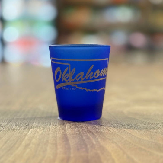 Elegant Oklahoma souvenir glass in blue with gold accents
