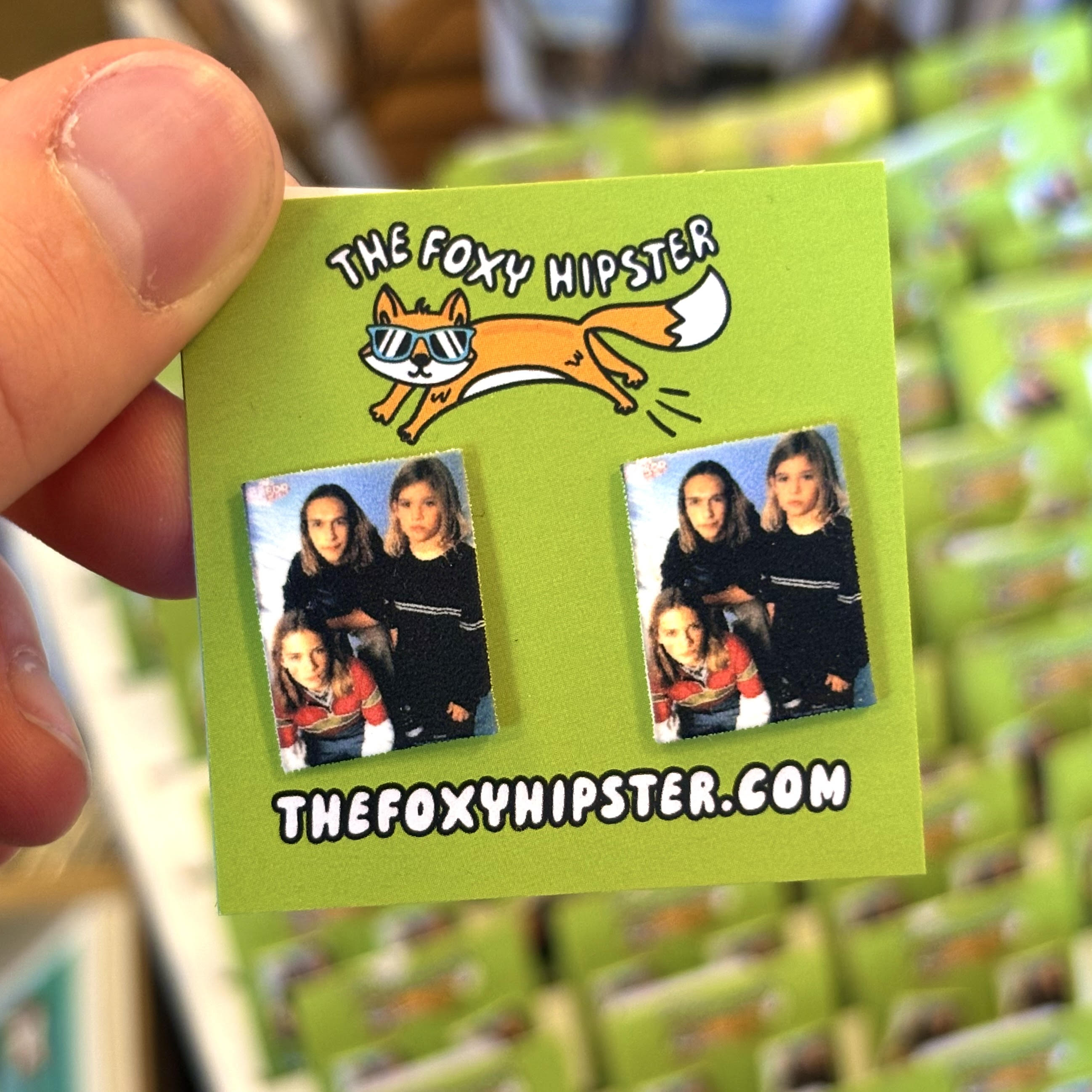 Square stud earrings featuring Hanson photo from their MMMBop era, nostalgic 90s pop music accessory.