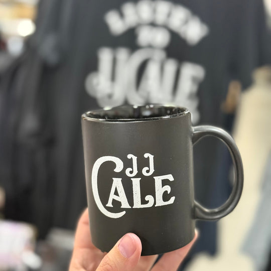 JJ Cale tribute mug being held – souvenir for music fans