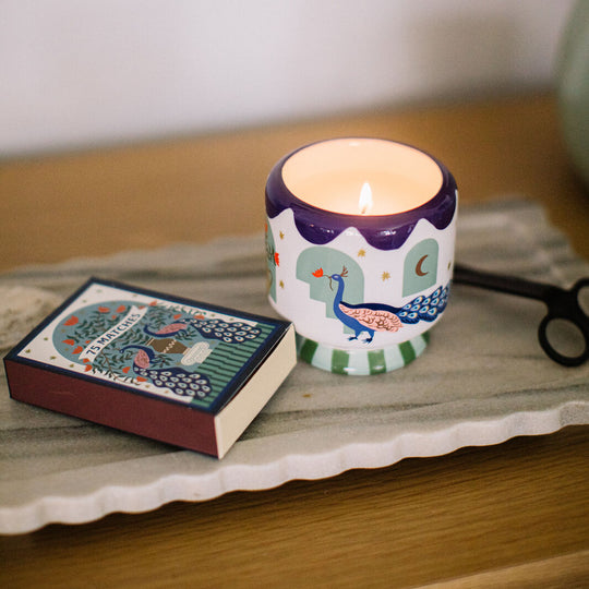 A Dopo 8oz Peacock Candle