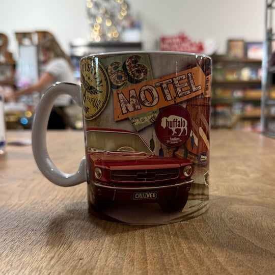 Ceramic mug featuring weathered Route 66 and mechanic artwork