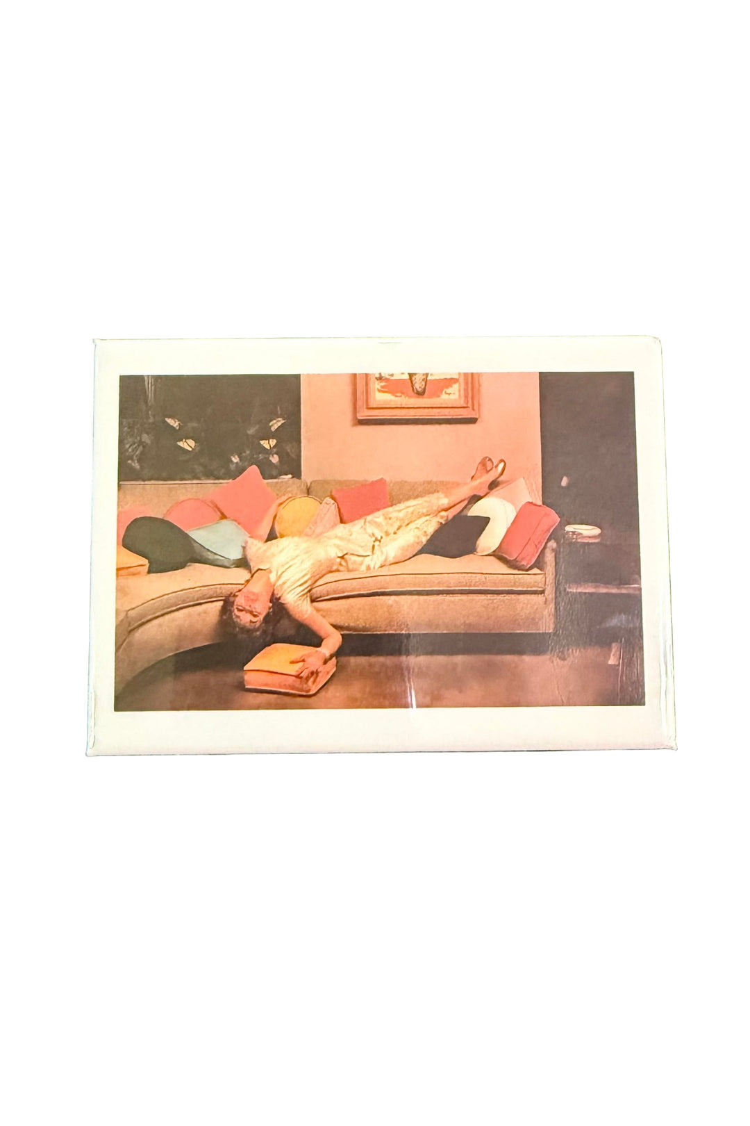 etro magnet with vintage woman lounging upside down on sofa