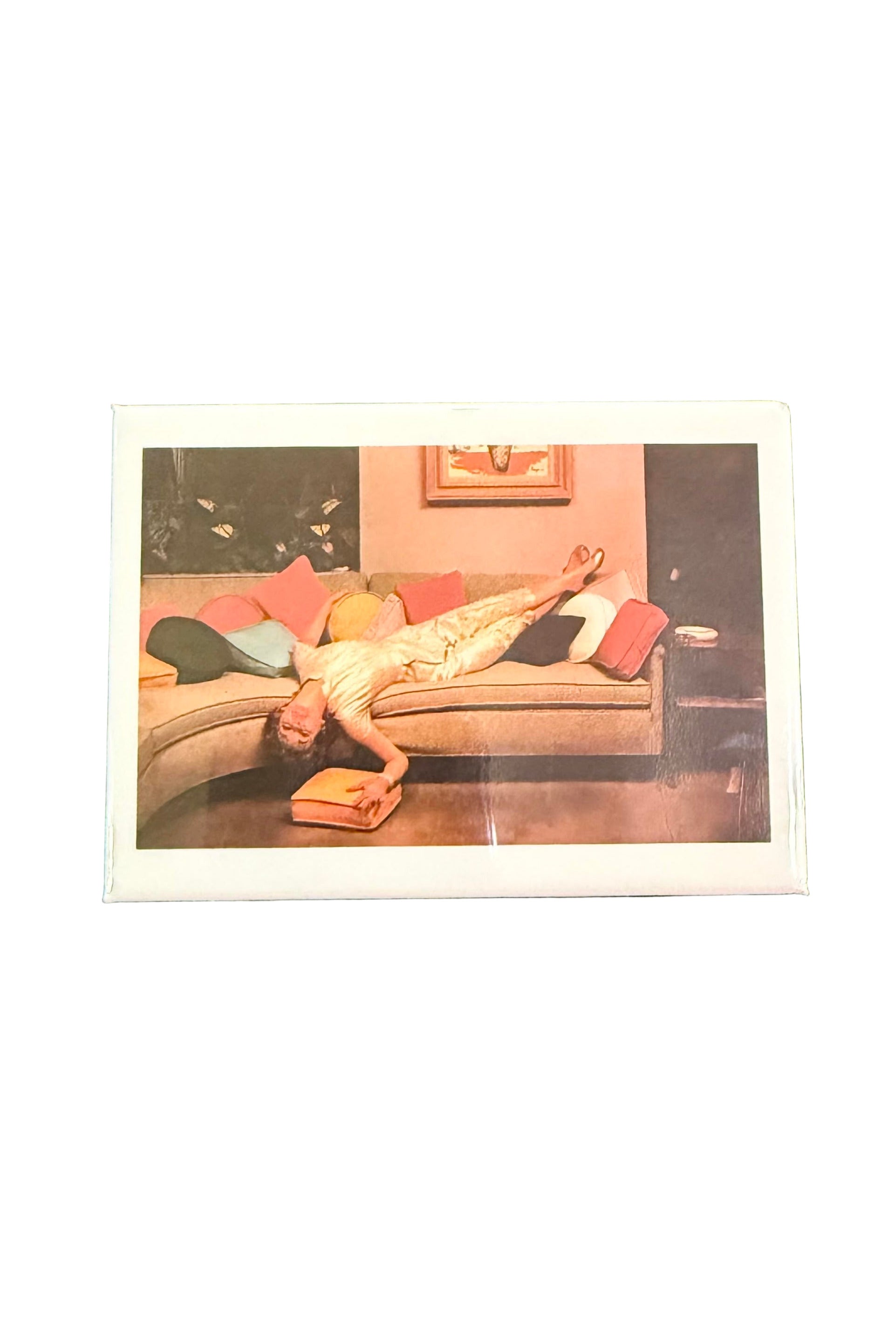 etro magnet with vintage woman lounging upside down on sofa