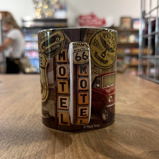 Coffee mug with Route 66 road shield and retro garage signs