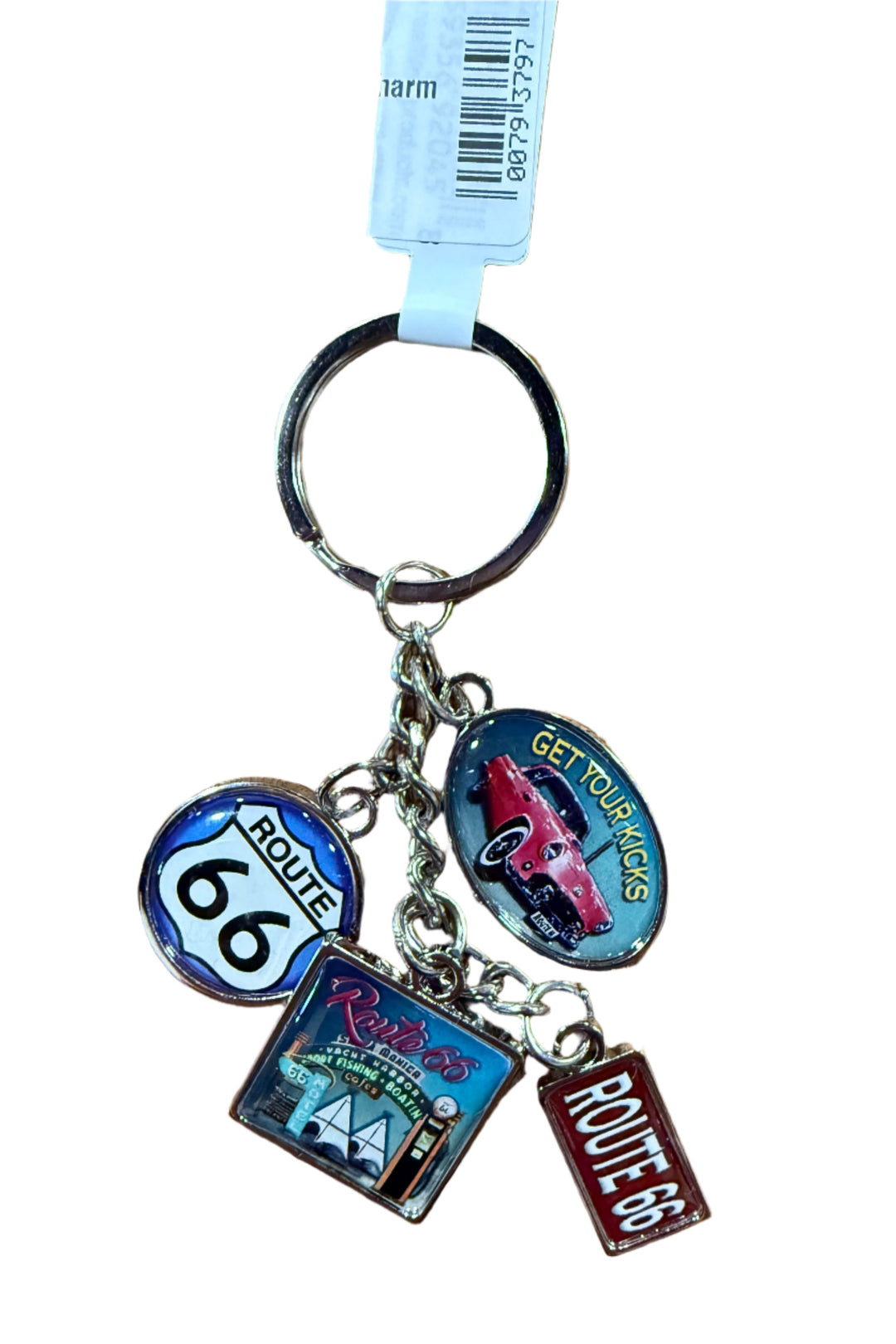 Charm keychain featuring car, road sign, Route 66 text, and attractions