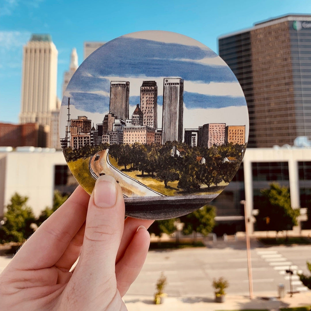 Vibrant cityscape design of downtown Tulsa on an absorbent waterstone coaster with cork backing