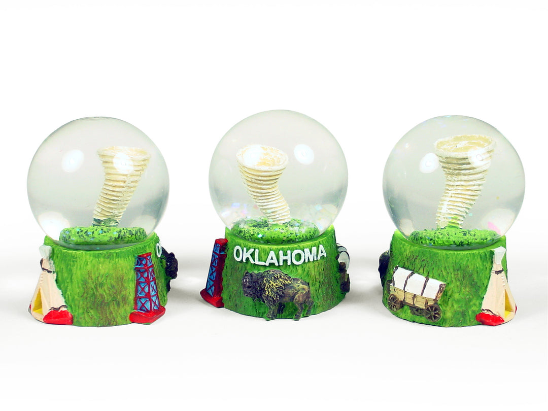 Tornado themed Oklahoma collectible snow globe with buffalo and oil derrick
