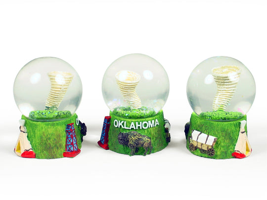 Tornado themed Oklahoma collectible snow globe with buffalo and oil derrick