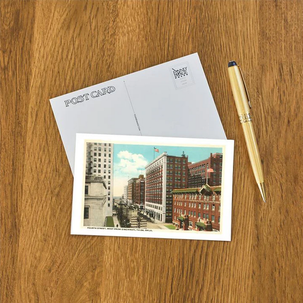 Classic Tulsa postcard featuring a vintage street view of downtown Fourth Street, perfect for collectors.