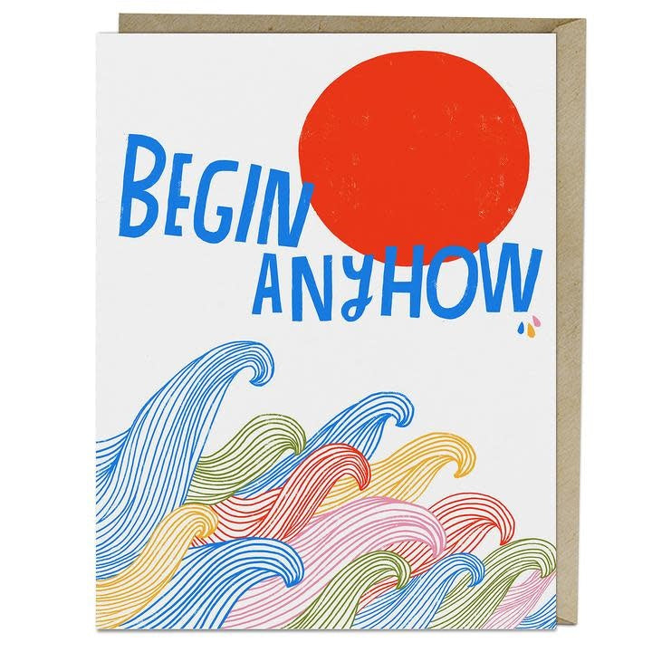 Greeting card with “Begin Anyhow” text and colorful wave design on the front, blank inside