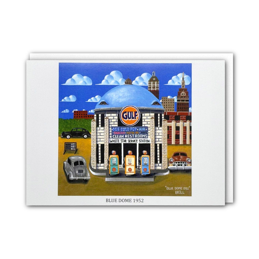 A card featuring a colorful illustration of the Blue Dome building, with vintage cars, a city skyline under white clouds. The print is shown against a white background with a white envelope behind it.
