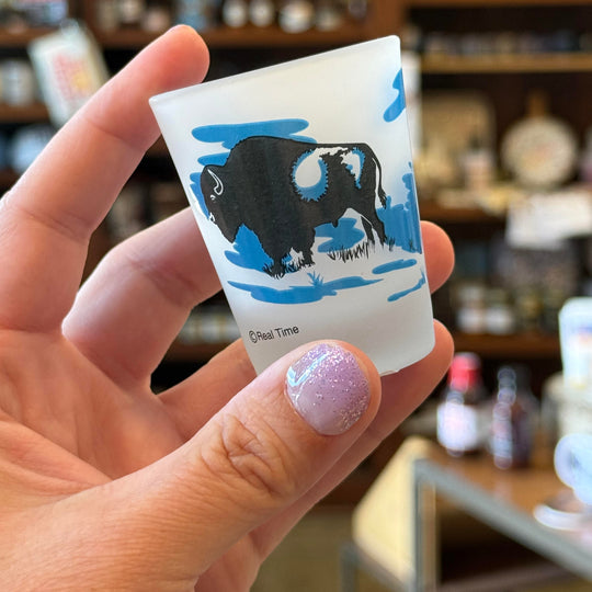 Oklahoma souvenir shot glass with frosted finish and Native-inspired imagery of teepees and a buffalo