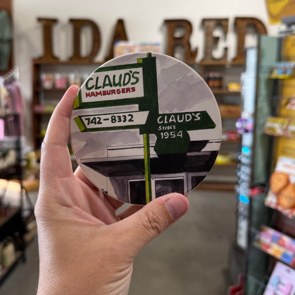 Vintage-style coaster paying tribute to Claud’s Hamburgers