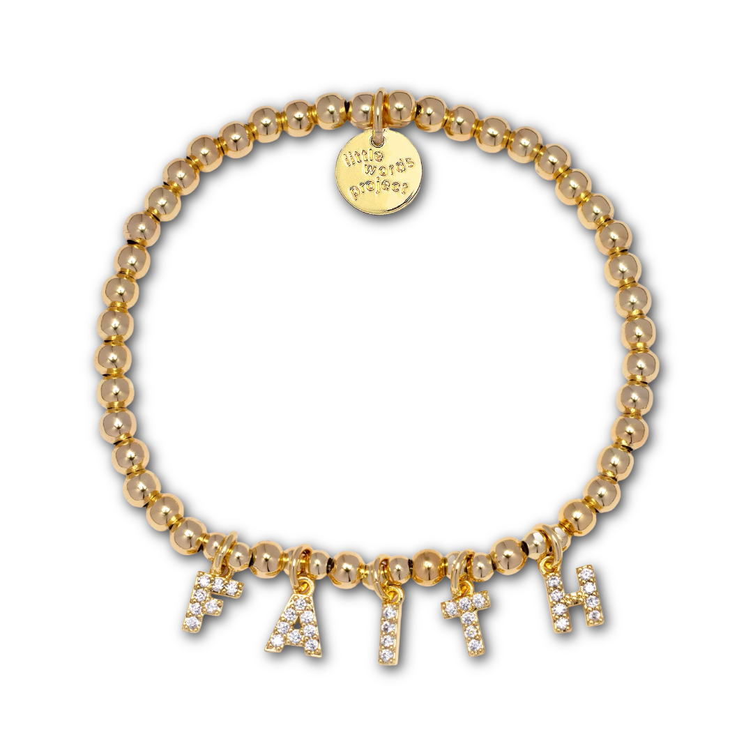 Gold beaded bracelet with gold and rhinestone letter-shaped charms spelling out "FAITH".