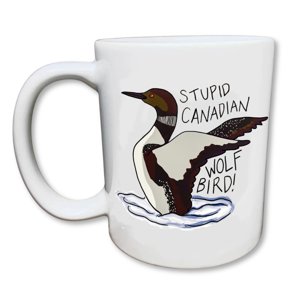 A white ceramic mug featuring an illustrated Canadian goose with the phrase “stupid Canadian wolf bird” in a humorous design.