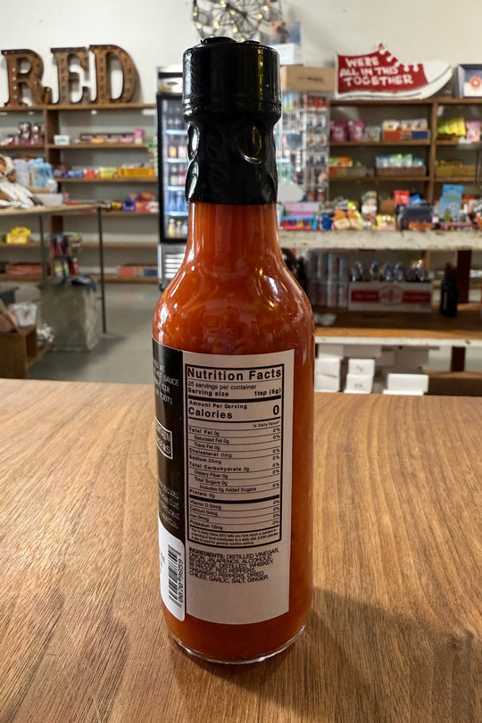 Humorous hot sauce gift from Oklahoma | “This Sauce Sucks” by Rescue Dog Hot Sauce