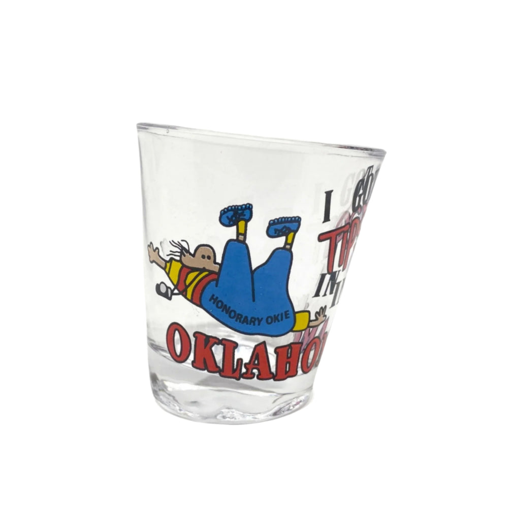 Funny Oklahoma shot glass – 'Tipsy in Oklahoma' with cartoon person falling down