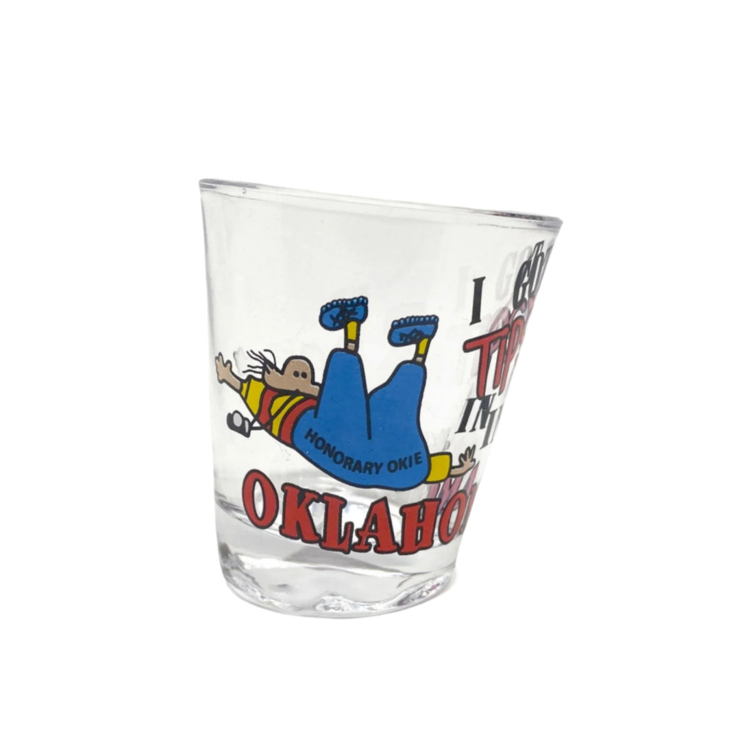 Funny Oklahoma shot glass – 'Tipsy in Oklahoma' with cartoon person falling down