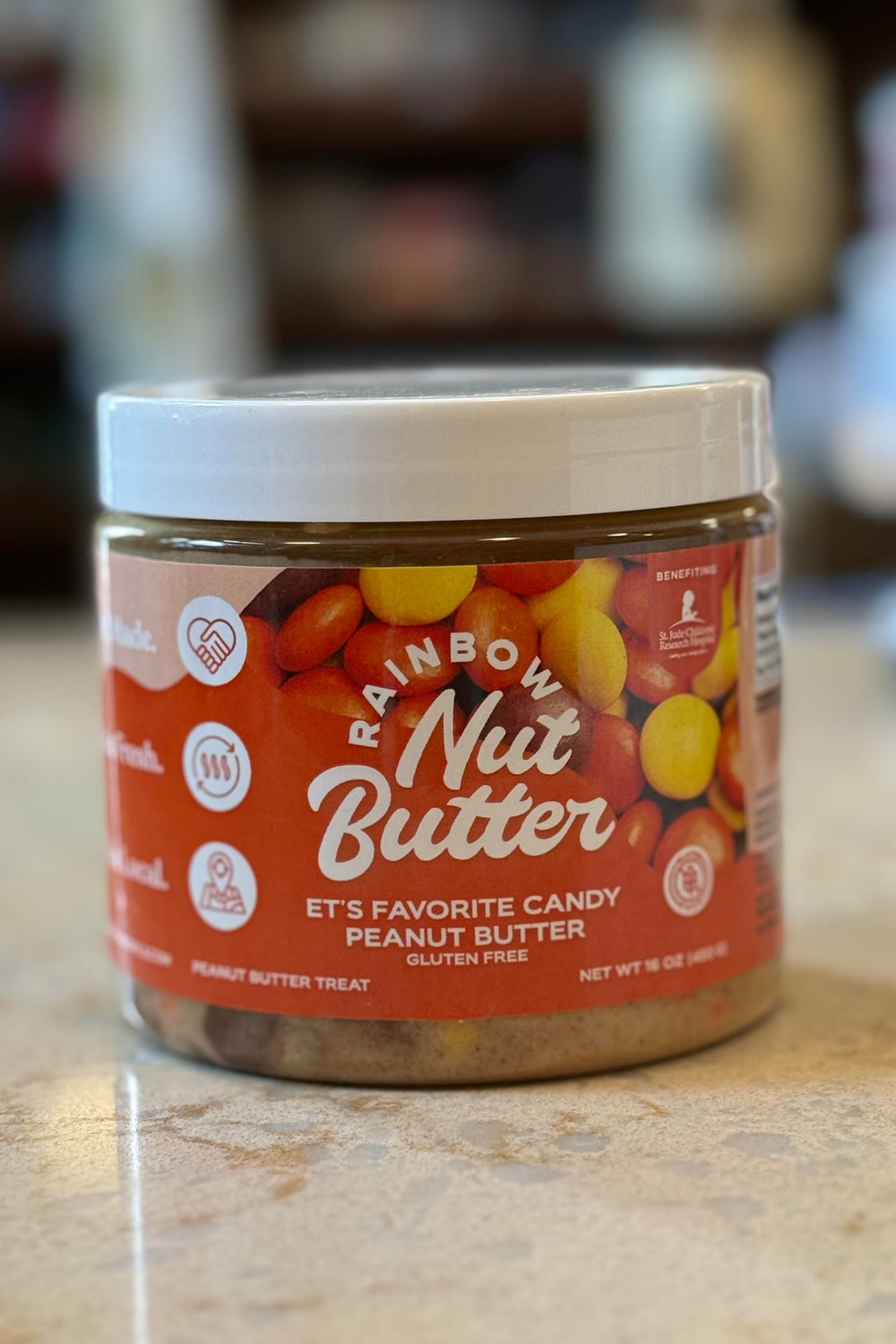 Gluten-free candy-inspired peanut butter with real chocolate pieces, made in Oklahoma