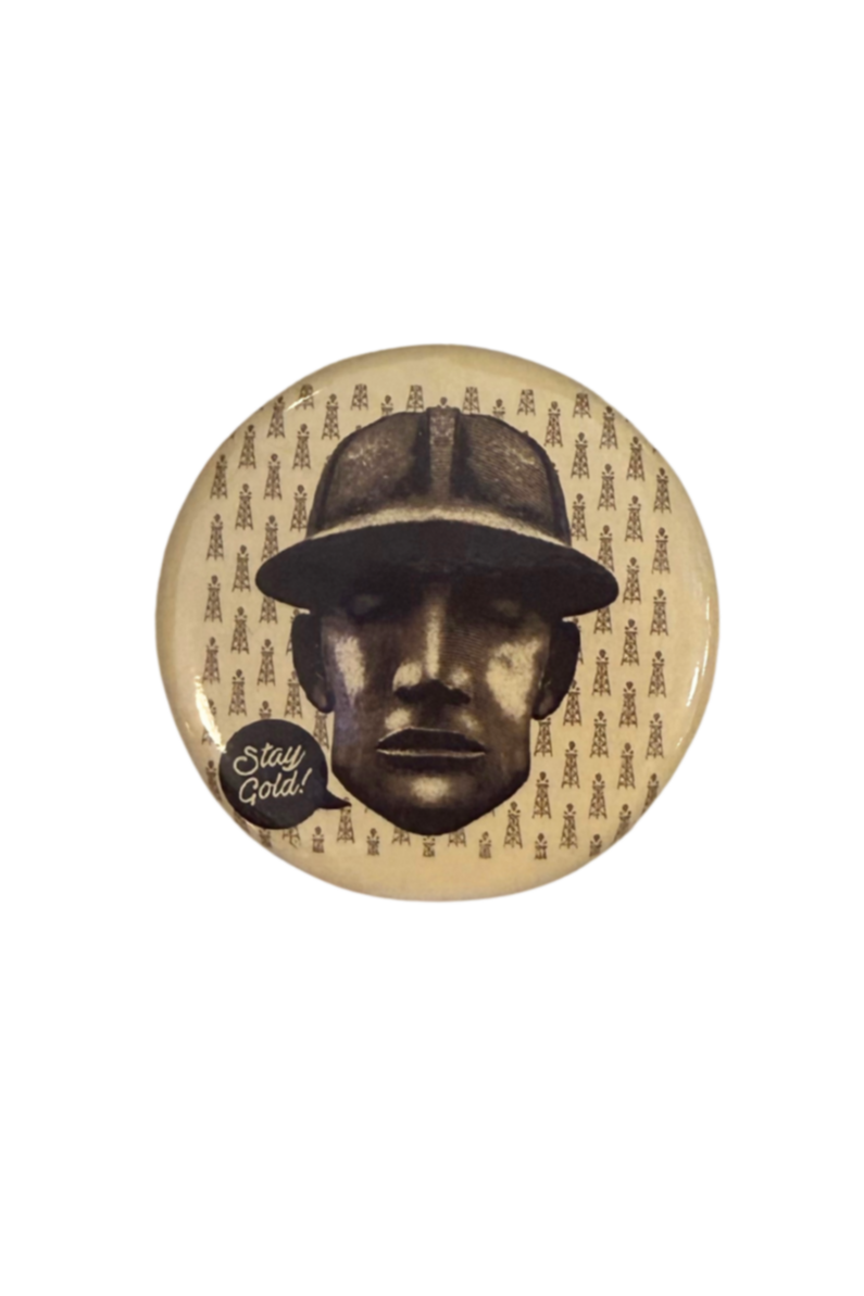 Round magnet featuring the Golden Driller statue with the text “Stay Gold,” Tulsa souvenir