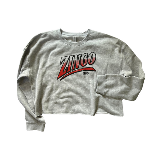 Grey cropped sweatshirt with red and white Zingo roller coaster logo from Bell’s Amusement Park