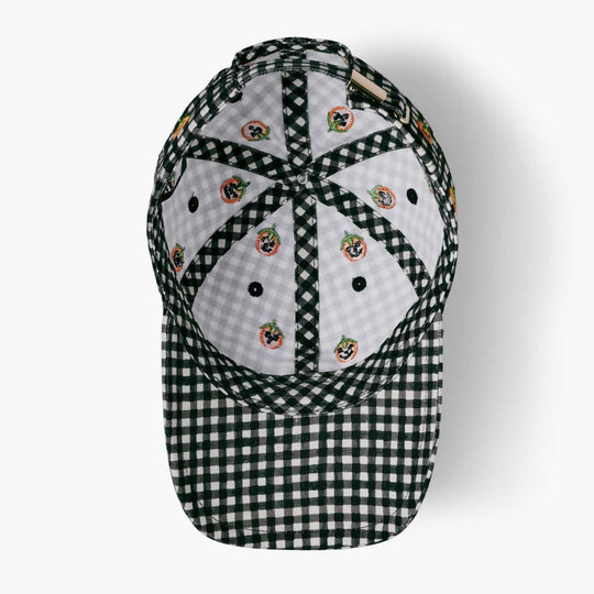 A baseball cap featuring a black and white gingham pattern on the brim and side panels, with white front panels decorated with small embroidered floral motifs, shown against a plain white background.