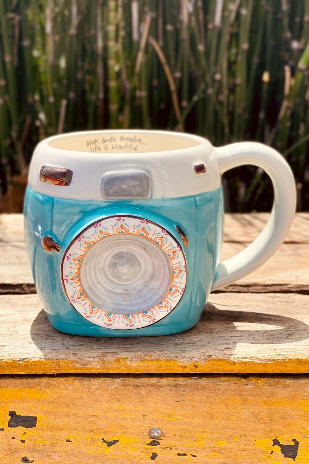 Cute hand-sculpted mug with a hidden inspirational message on the inside rim