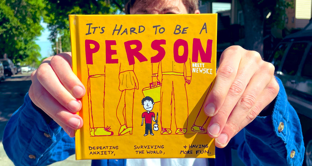 Book cover of It’s Hard to Be a Person by Brett Newski, blending humor and mental health through illustrated pages