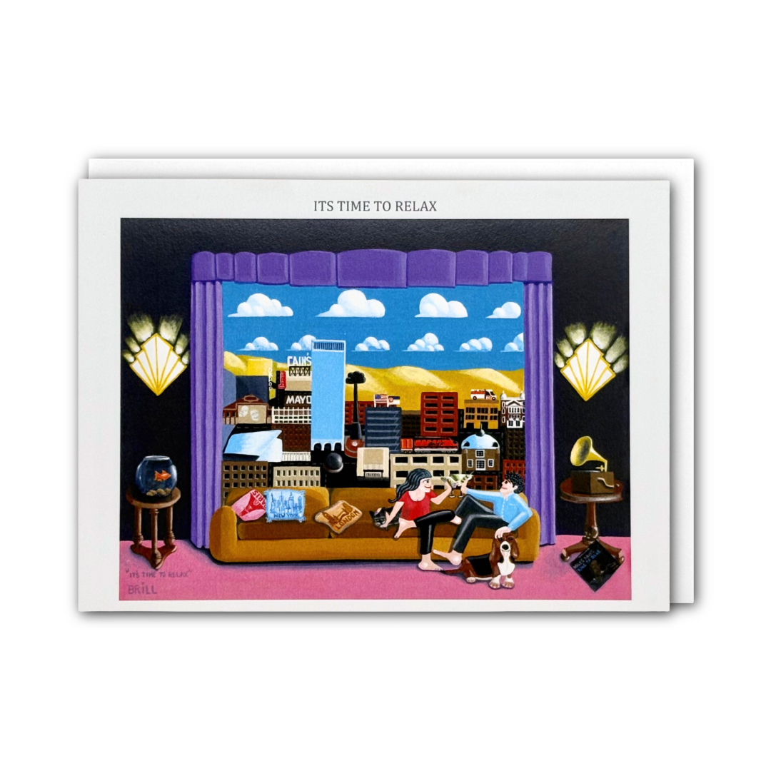 A greeting card featuring a whimsical illustration of a living room scene with a couch, people lounging, a cityscape through a window, and the text 'ITS TIME TO RELAX' at the top, shown against a plain white background.