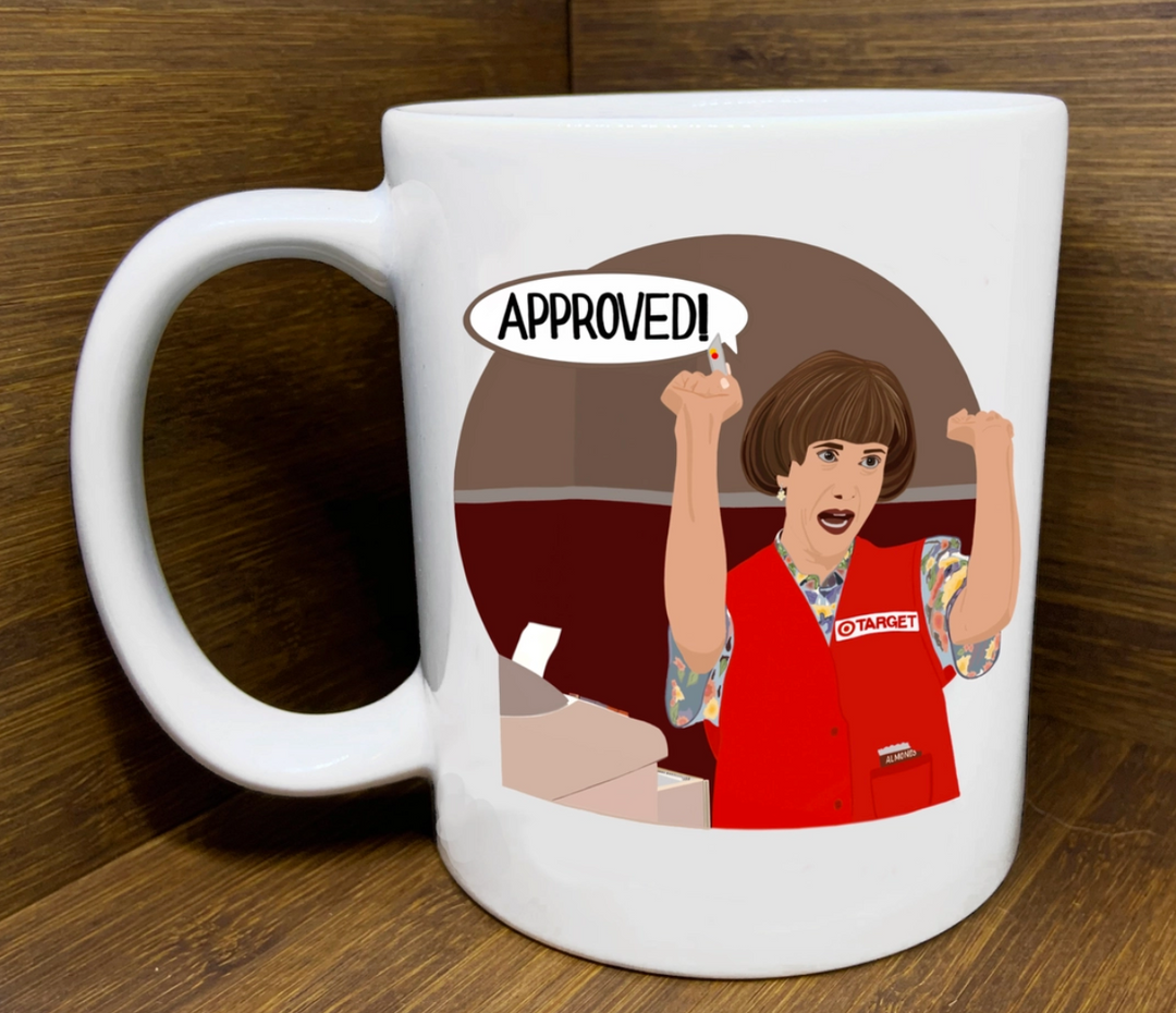 11 oz mug with illustration of Kristen Wiig as the Target Lady shouting “Approved” from SNL