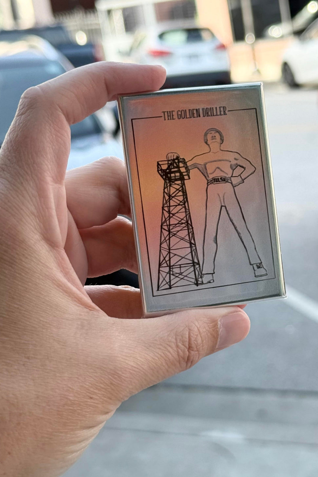 Metallic Golden Driller rectangle magnet featuring iconic Tulsa landmark