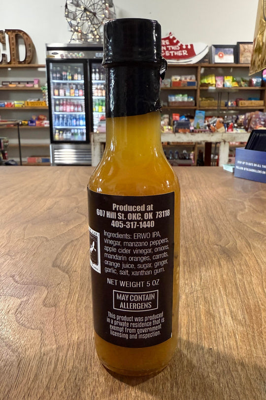 Small-batch mandarin hot sauce with clever name and bold flavor from Rescue Dog Hot Sauce