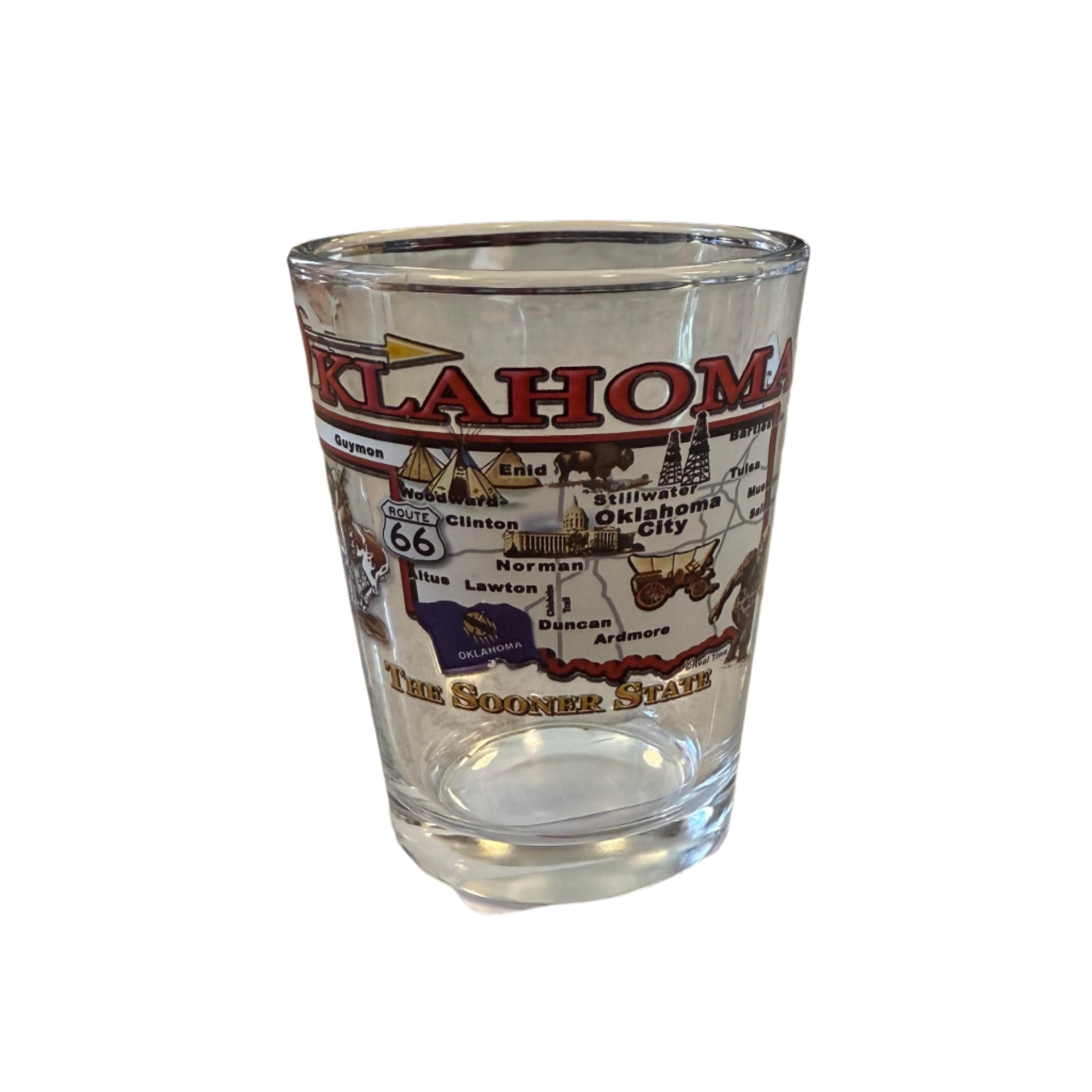 Clear shot glass with Oklahoma state map, "Oklahoma" text above, and "The Sooner State" below – perfect Oklahoma souvenir