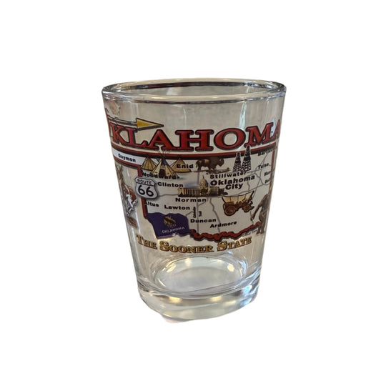 Clear shot glass with Oklahoma state map, "Oklahoma" text above, and "The Sooner State" below – perfect Oklahoma souvenir