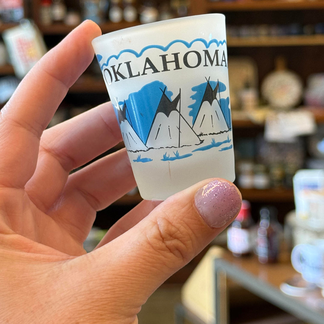 Frosted Oklahoma shot glass with buffalo and teepee art in black and blue – cultural souvenir gift